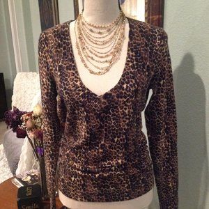 Express soft animal print sweater!